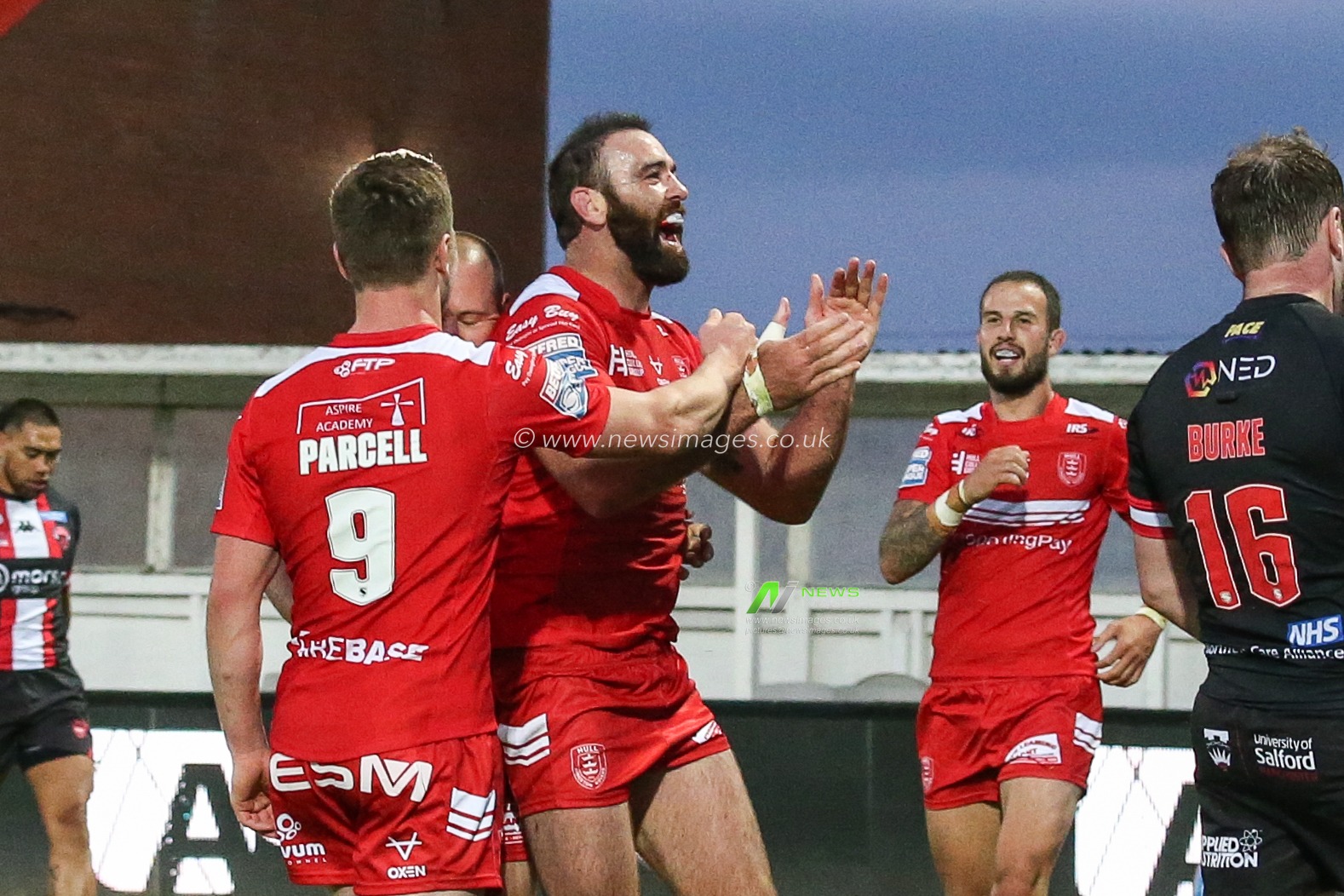 Kane Linnett (12) of Hull KR celebrates his try