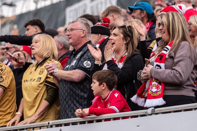 Wrexham fans celebrate Jay Rodriguezâ€™ opening goal during the Sky Bet League 1 match Wrexham vs Stockport County at SToK Cae Ras, Wrexham, United Kingdom, 22nd March 2025

(Photo by Nik Mesney/News Images)