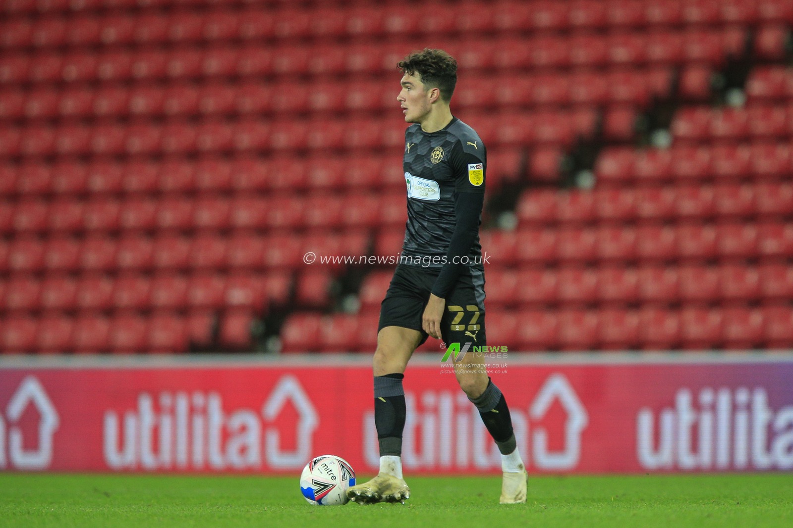 Kyle Joseph #22 of Wigan Athletic in possession of the ball