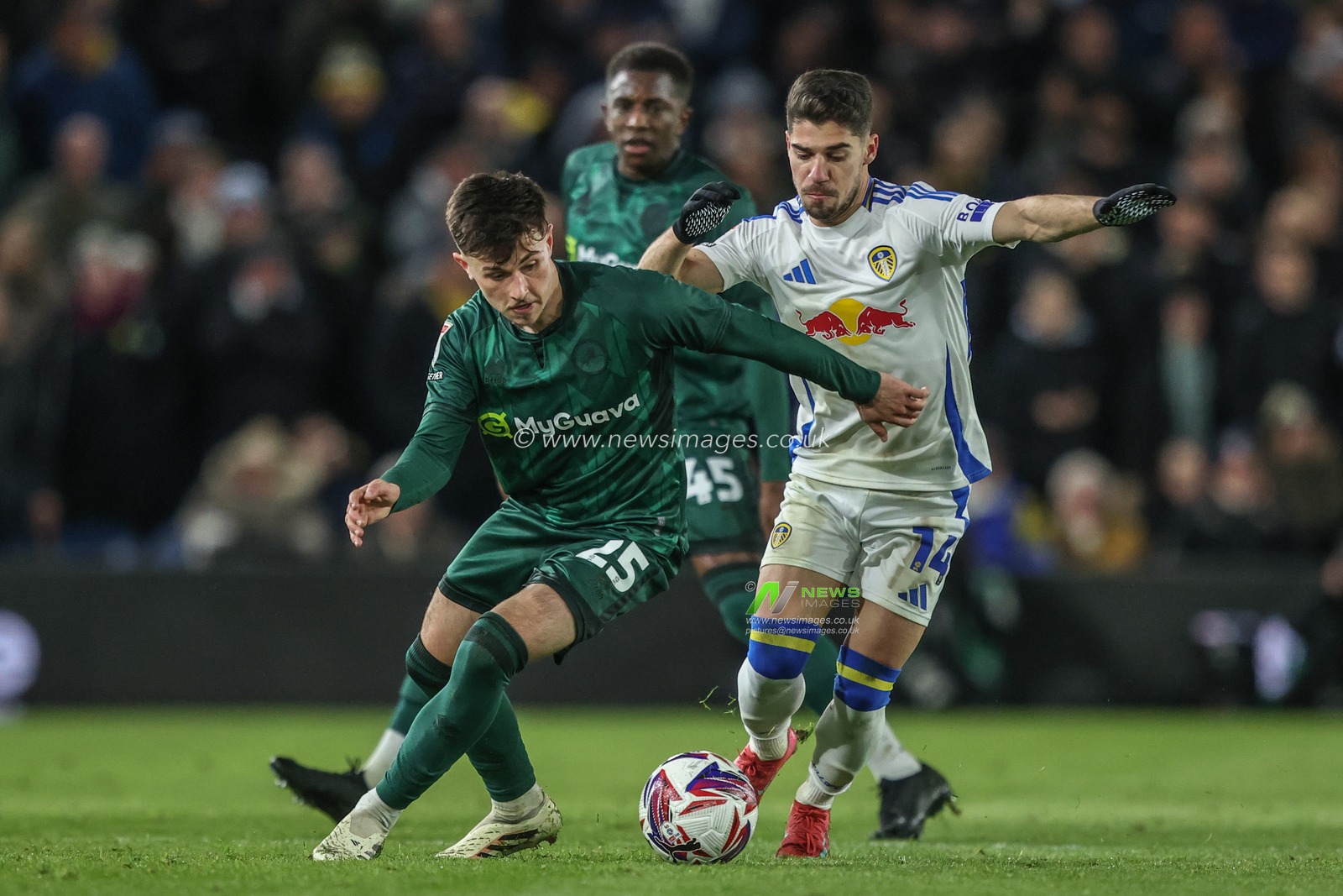 Luke Cundle of Millwall andManor Solomon of Leeds United battle for the ball during the Sky Bet Championship match Leeds United vs Millwall at Elland Road, Leeds, United Kingdom, 12th March 2025

(Photo by Alfie Cosgrove/News Images)