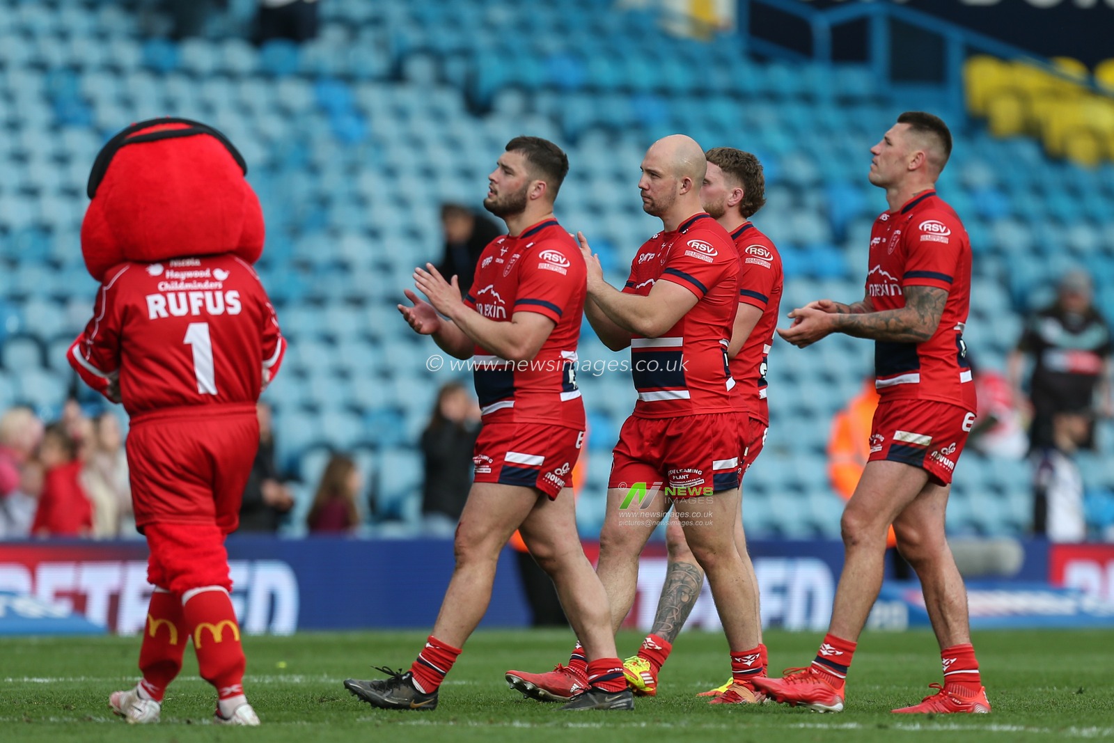 Hull KR players applaud the travelling fans