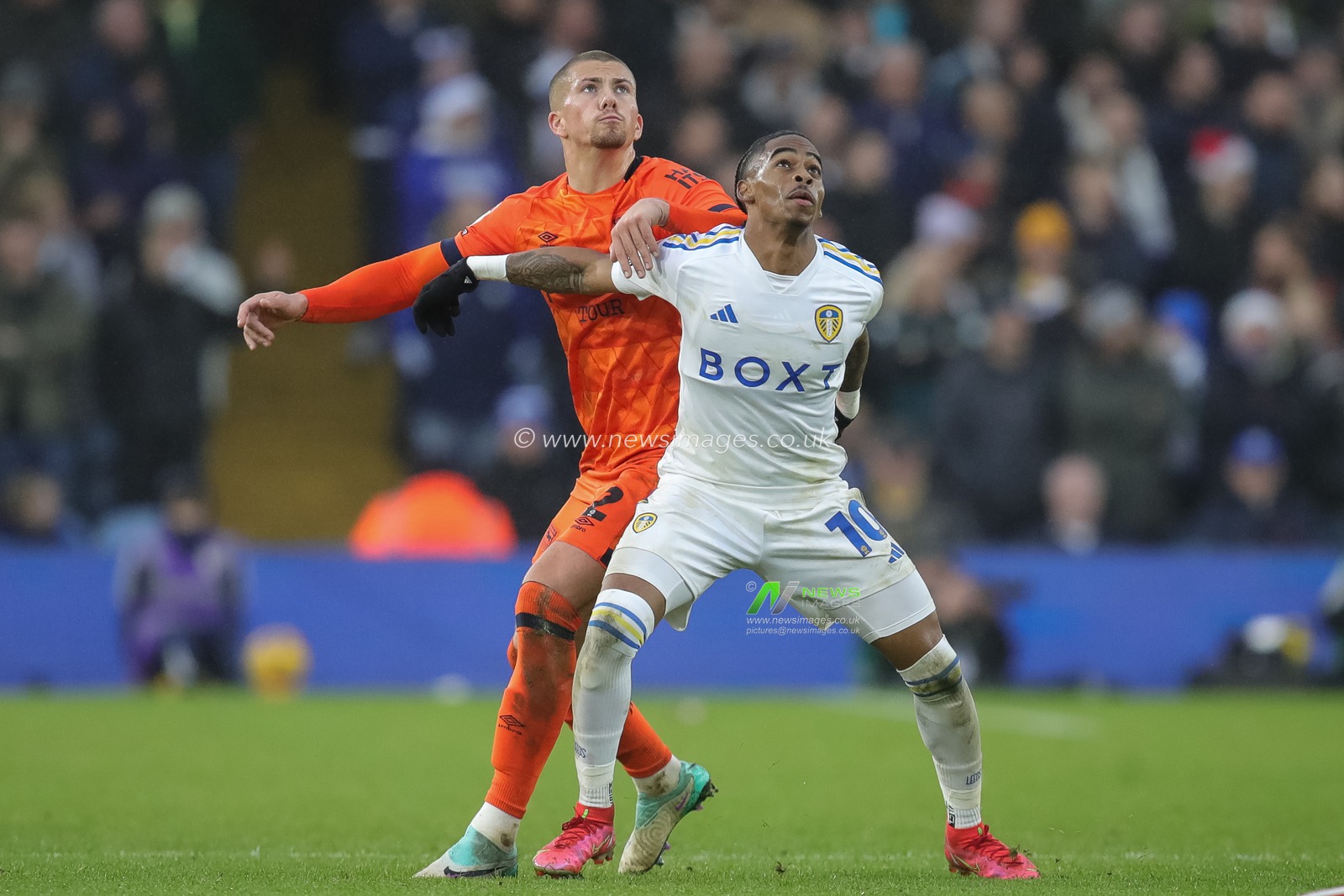Crysencio Summerville #10 of Leeds United and Harry Clarke #2 of Ipswich Town battle for the ball during the Sky Bet Championship match Leeds United vs Ipswich Town at Elland Road, Leeds, United Kingdom, 23rd December 2023

(Photo by James Heaton/News Images)