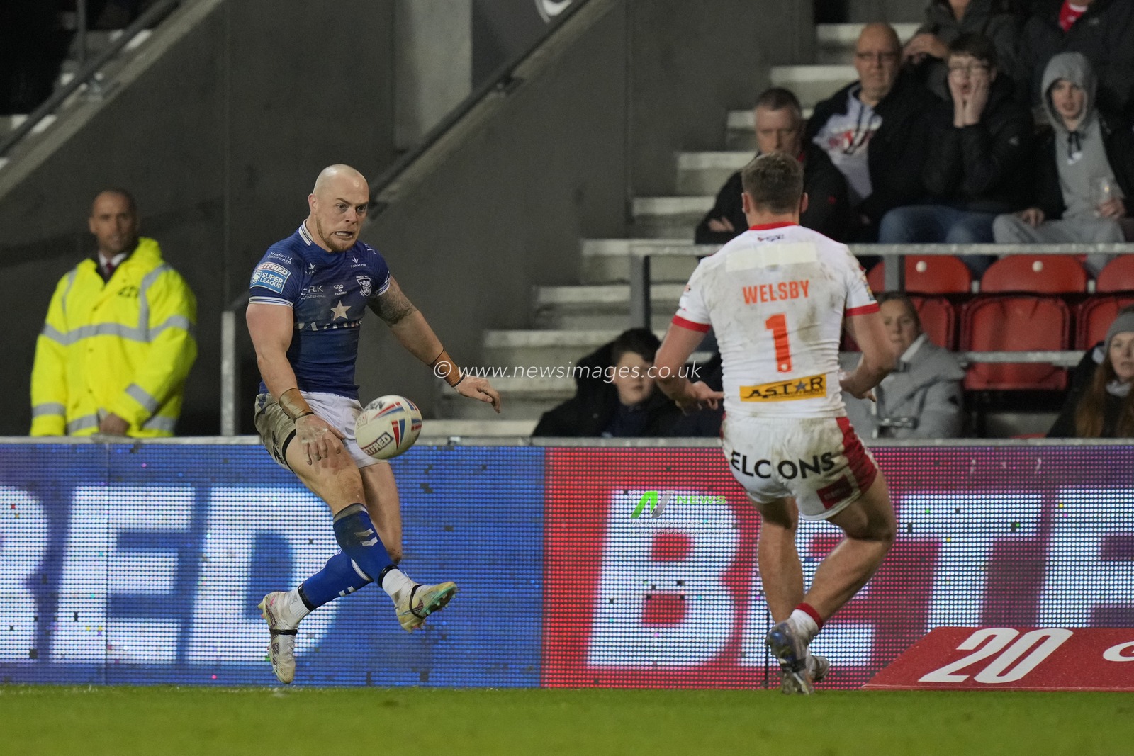 Adam Swift #2 of Hull FC chips the ball over Jack Welsby #1 of St Helens during the Betfred Super League Round 5 match St Helens vs Hull FC at Totally Wicked Stadium, St Helens, United Kingdom, 17th March 2023

(Photo by Steve Flynn/News Images)