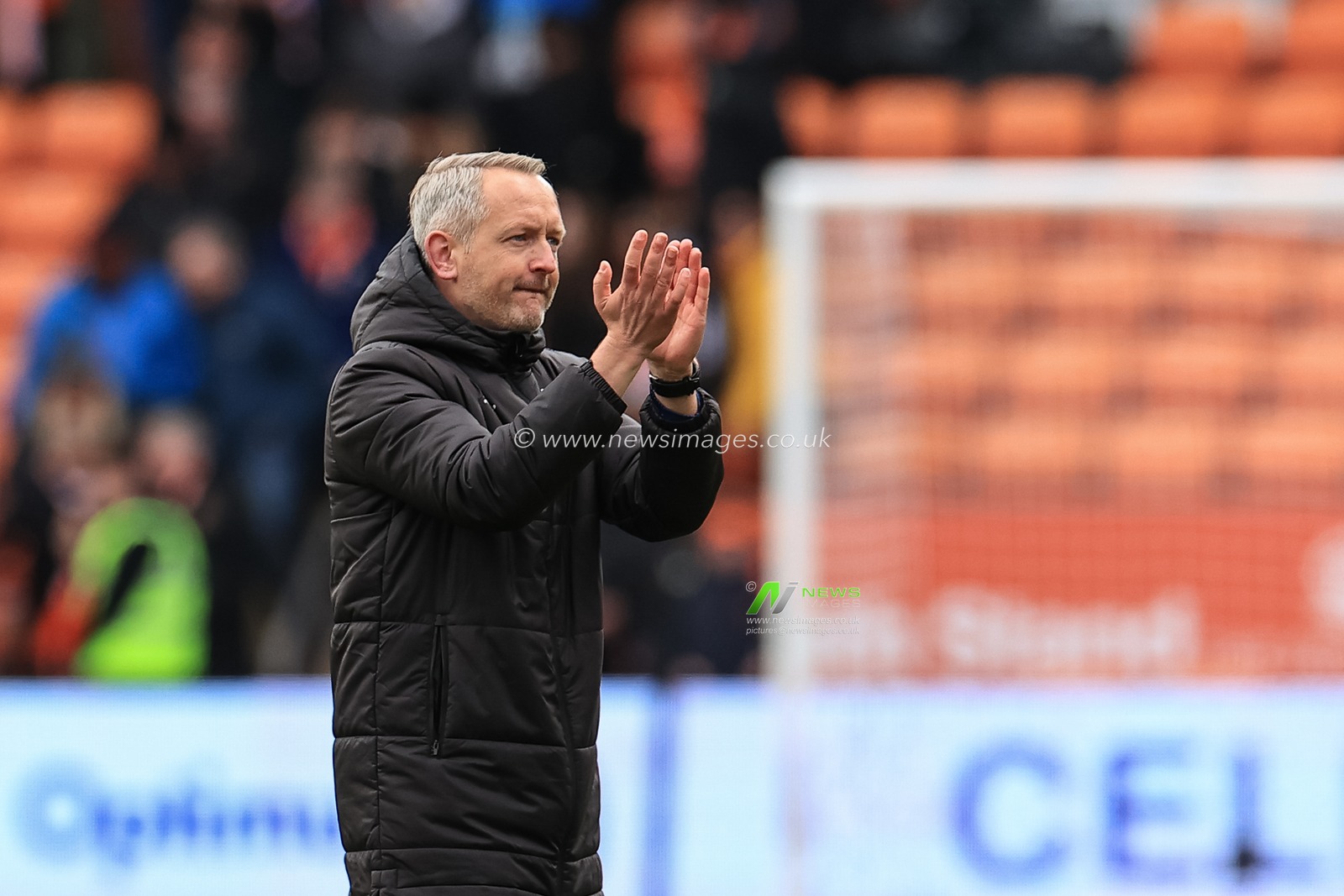 Neil Critchley head coach of Blackpool applauds the fans