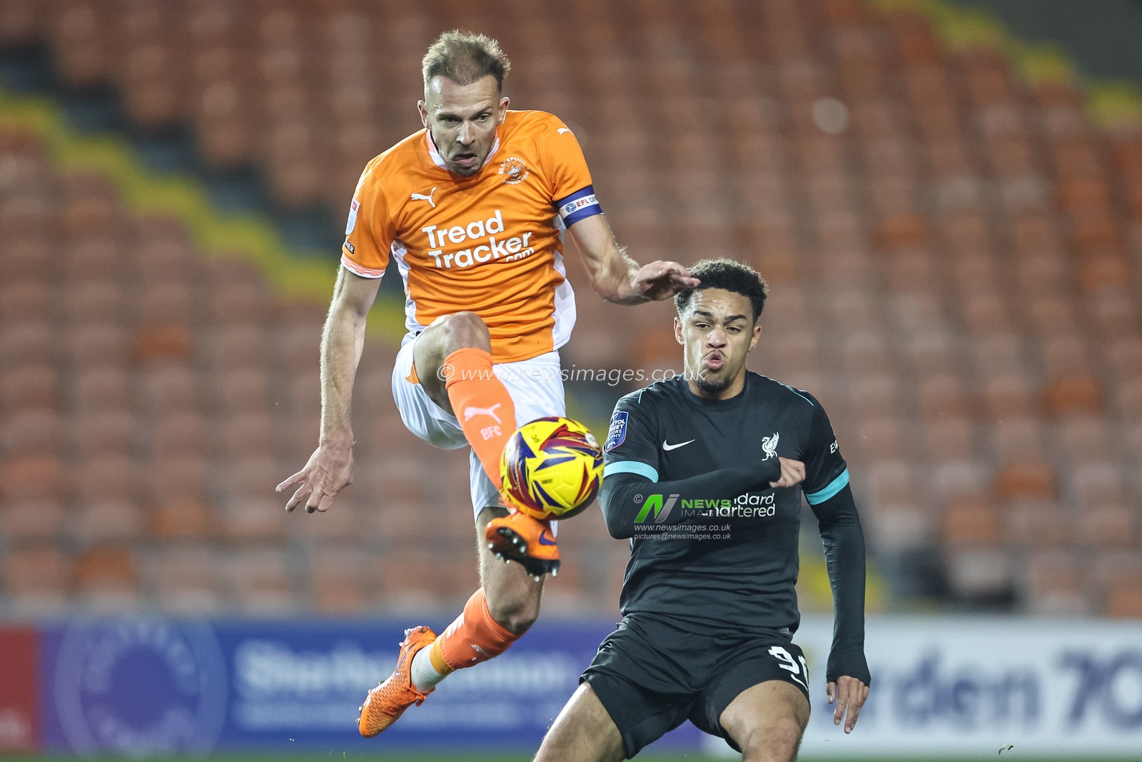 Jordan Rhodes of Blackpool jumps up to win the high ball during the Bristol Street Motors Trophy match Blackpool vs Liverpool U21 at Bloomfield Road, Blackpool, United Kingdom, 6th November 2024

(Photo by Mark Cosgrove/News Images)