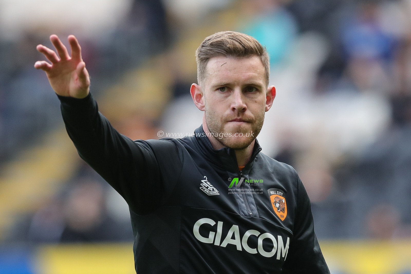 Callum Elder #3 of Hull City waves to the fans during the pre match warm up ahead of the Sky Bet Championship match Hull City vs Watford at MKM Stadium, Hull, United Kingdom, 22nd April 2023

(Photo by James Heaton/News Images)