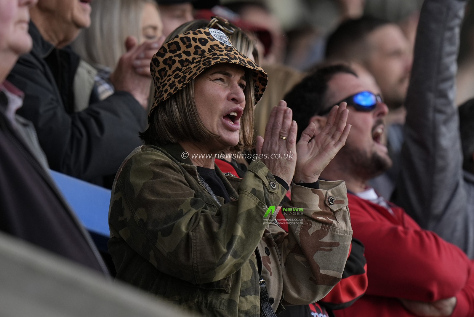 A Leigh Leopards fan cheers on her side during the Betfred Super League Round 8 match Warrington Wolves vs Leigh Leopards at Halliwell Jones Stadium, Warrington, United Kingdom, 20th April 2024

(Photo by Steve Flynn/News Images)