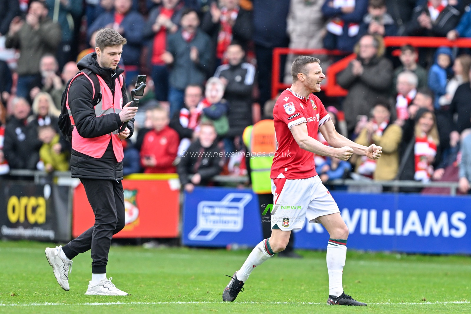 Paul Mullin of Wrexham celebrates the full time result, during the Sky Bet League 2 match Wrexham vs Stockport County at SToK Cae Ras, Wrexham, United Kingdom, 27th April 2024

(Photo by Cody Froggatt/News Images)
