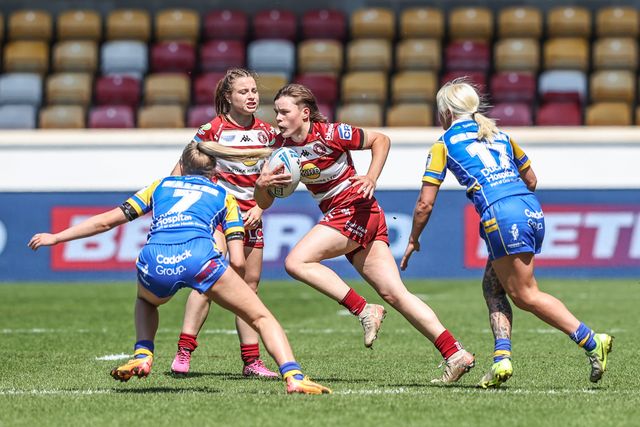 Molly Jones of Wigan Warriors breaks with the ball during the Betfred Women's Challenge Cup Cup Semi-final match Leeds Rhinos vs Wigan Warriors at LNER Community Stadium, York, United Kingdom, 10th May 2025

(Photo by Alfie Cosgrove/News Images)