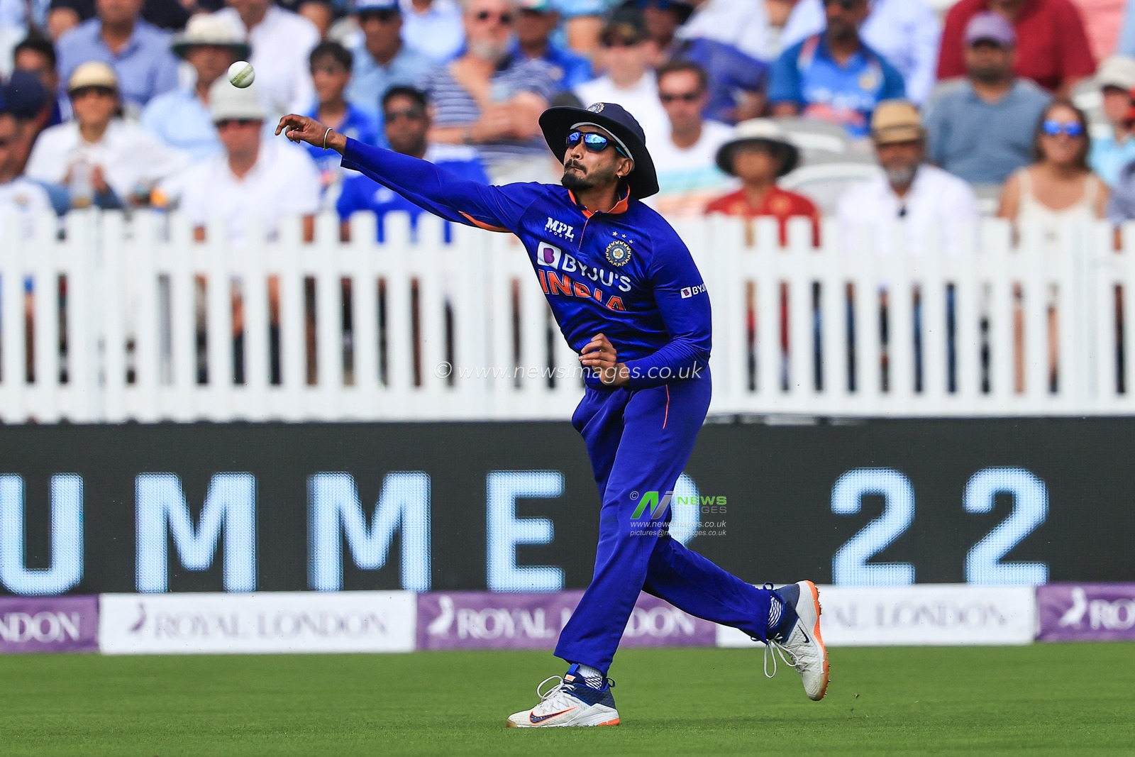 Shreyas Iyer of India throws to the stumps