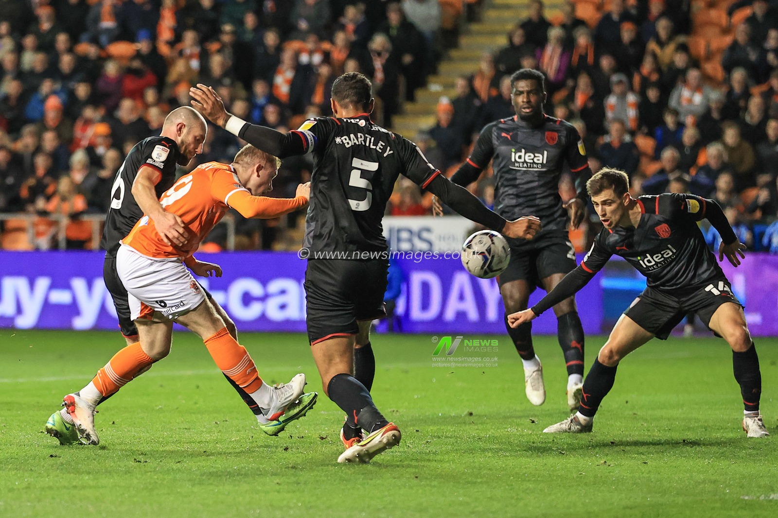 Shayne Lavery #19 of Blackpool shoots on goal, easy save for Sam Johnstone #1 of West Bromwich Albion