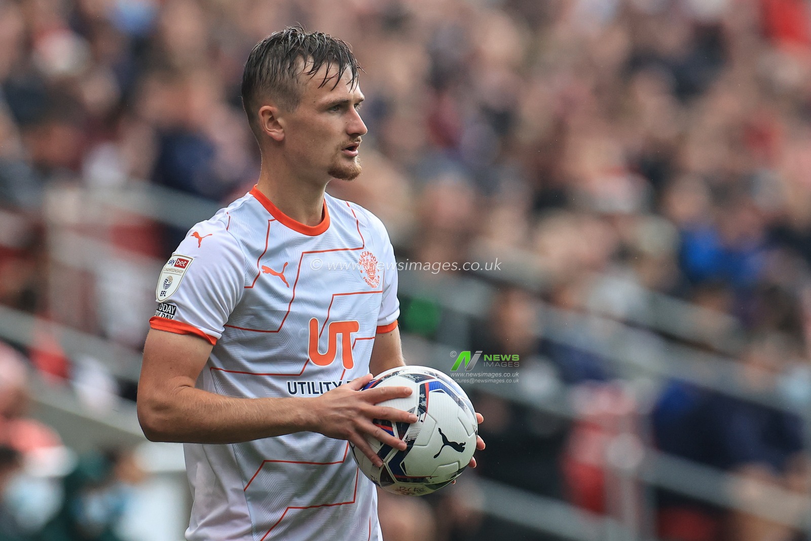 Callum Connolly #2 of Blackpool  prepares to take a throw-in