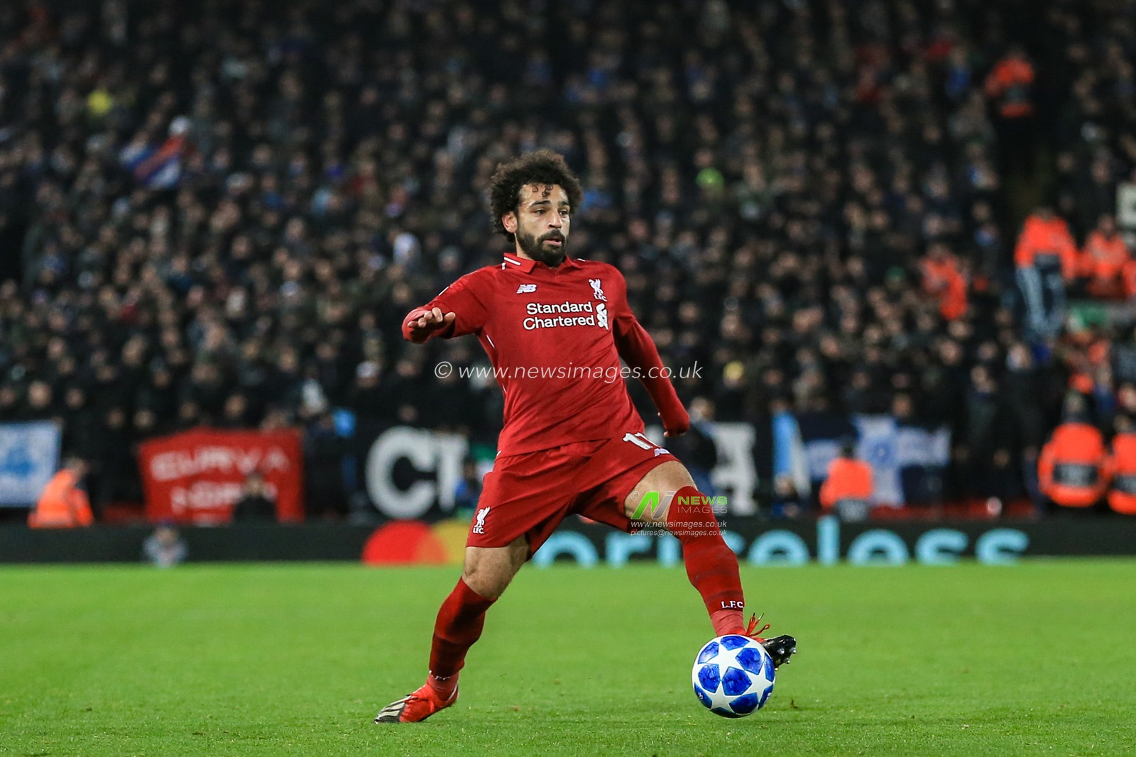 11th December 2018, Anfield, Liverpool, England; UEFA Champions League, Liverpool v Napoli ; Mohamed Salah (11) of Liverpool with the ball 


  Credit: Mark Cosgrove/News Images