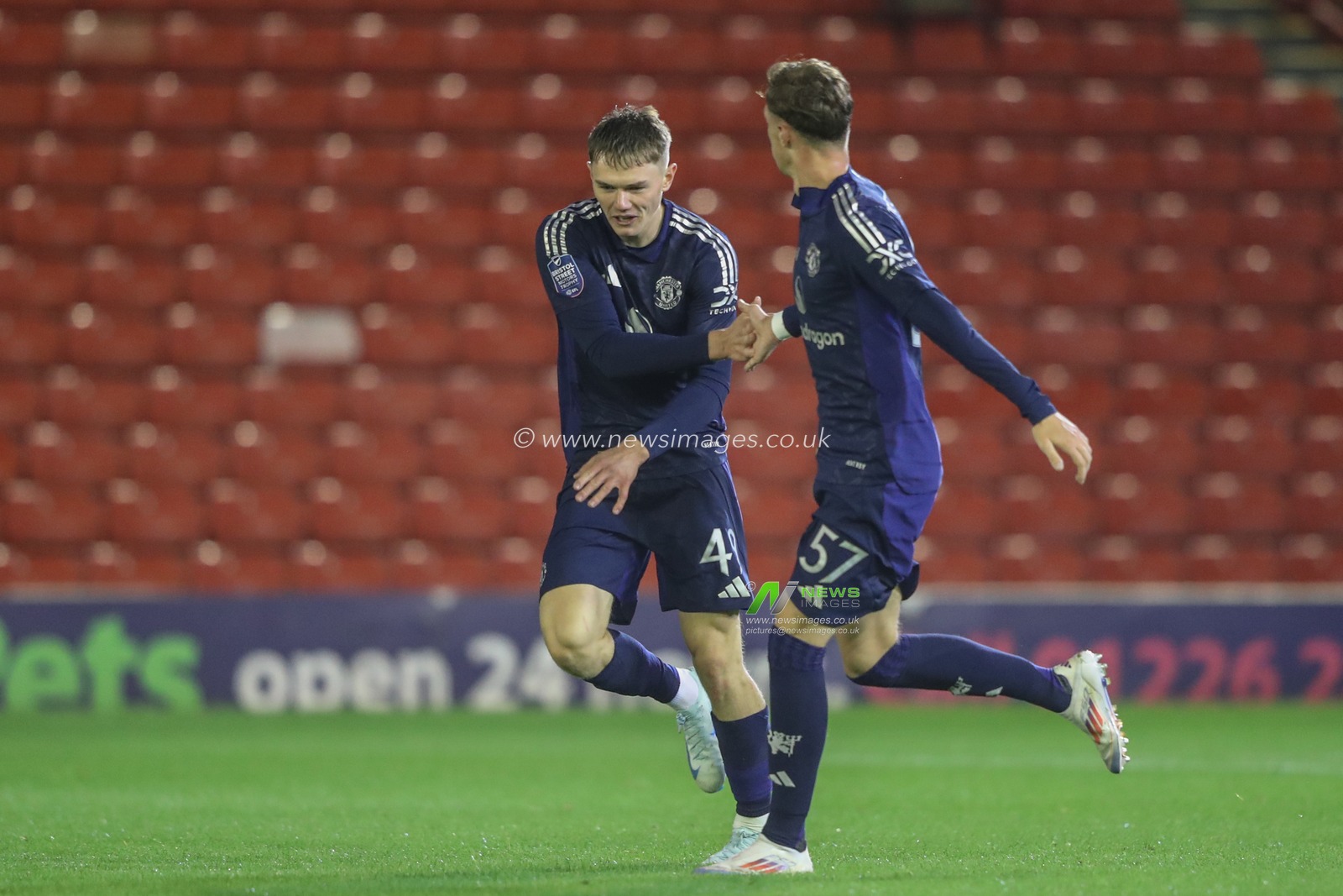 Ethan Ennis of Manchester United celebrates his goal to make it 2-1 during the Bristol Street Motors Trophy match Barnsley vs Manchester United U21 at Oakwell, Barnsley, United Kingdom, 20th August 2024

(Photo by Alfie Cosgrove/News Images)