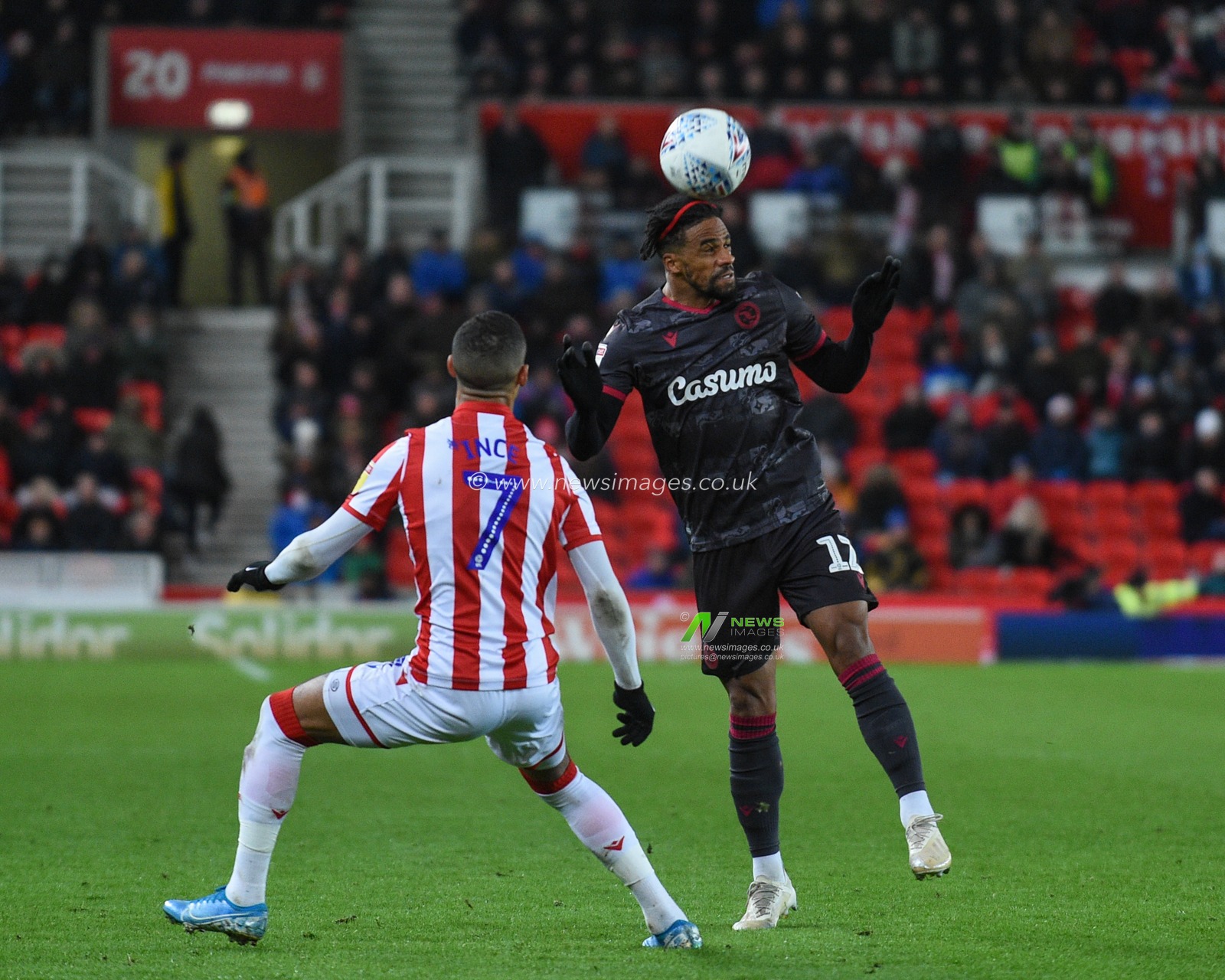 14th December 2019, Bet365 Stadium, Stoke-on-Trent, England; Sky Bet Championship, Stoke City v Reading : Garath McCleary (12) of Reading heads the ball

Credit: Richard Long/News Images