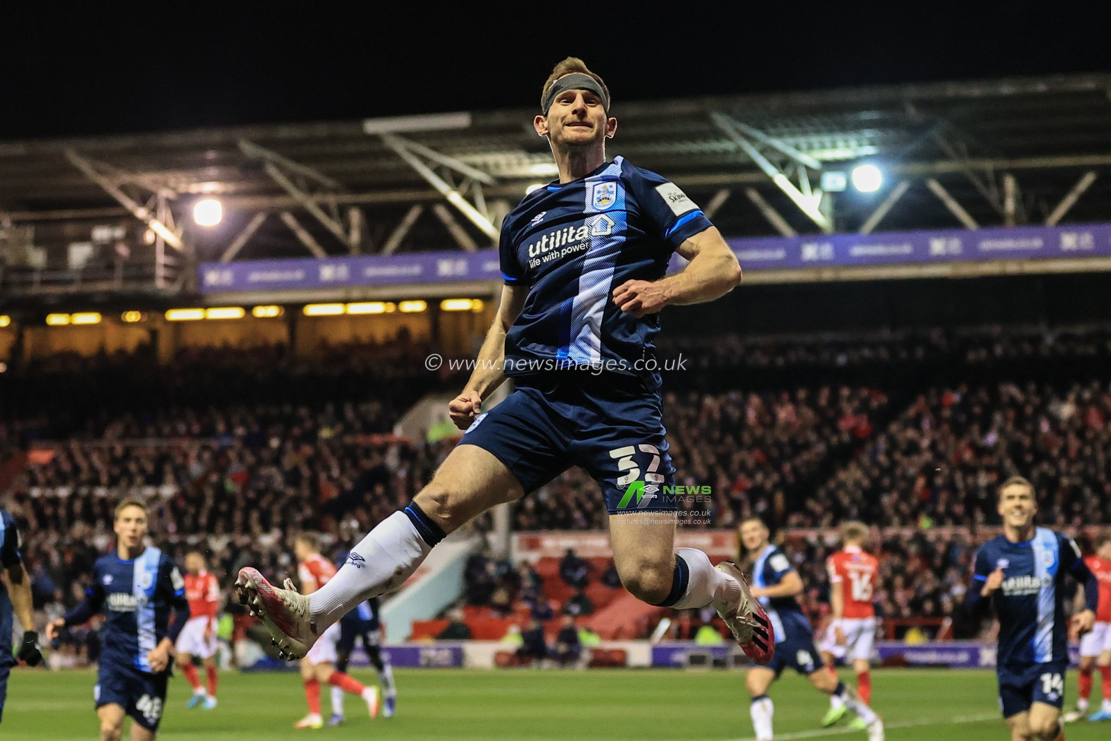Tom Lees #32 of Huddersfield Town celebrates his goal to make it 0-1