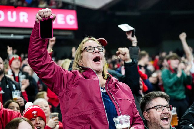Welsh fans celebrate their first try during the Quilter Nations Series 2025 match Wales vs New Zealand at Principality Stadium, Cardiff, United Kingdom, 22nd November 2025

(Photo by Andrew Lewis/News Images)

*** GER AUT SUI OUT ***
