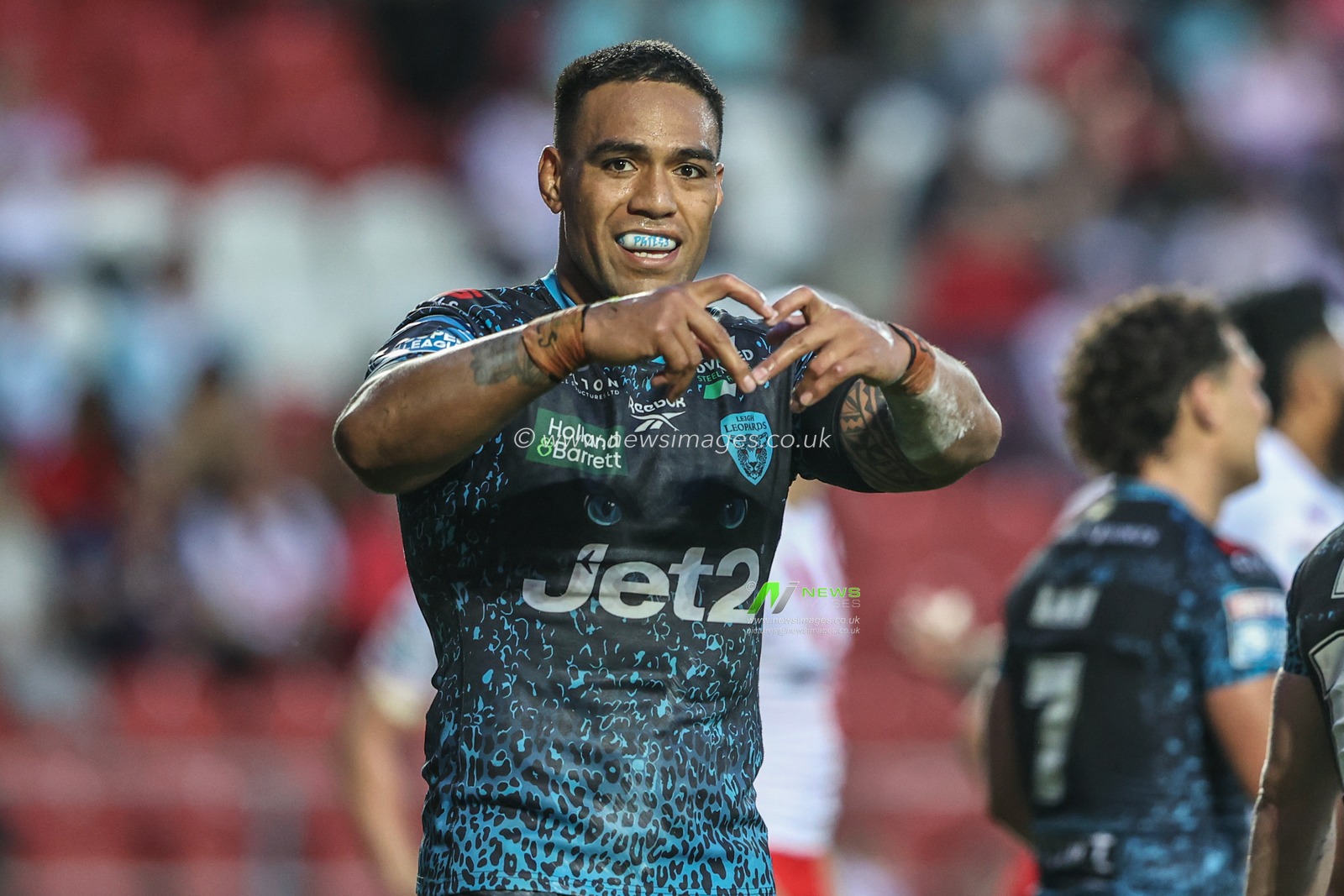 Joe Ofahengaue of Leigh Leapords celebrates his try during the Betfred Super League round 19 match St Helens vs Leigh Leopards at Totally Wicked Stadium, St Helens, United Kingdom, 17th July 2025

(Photo by Alfie Cosgrove/News Images)