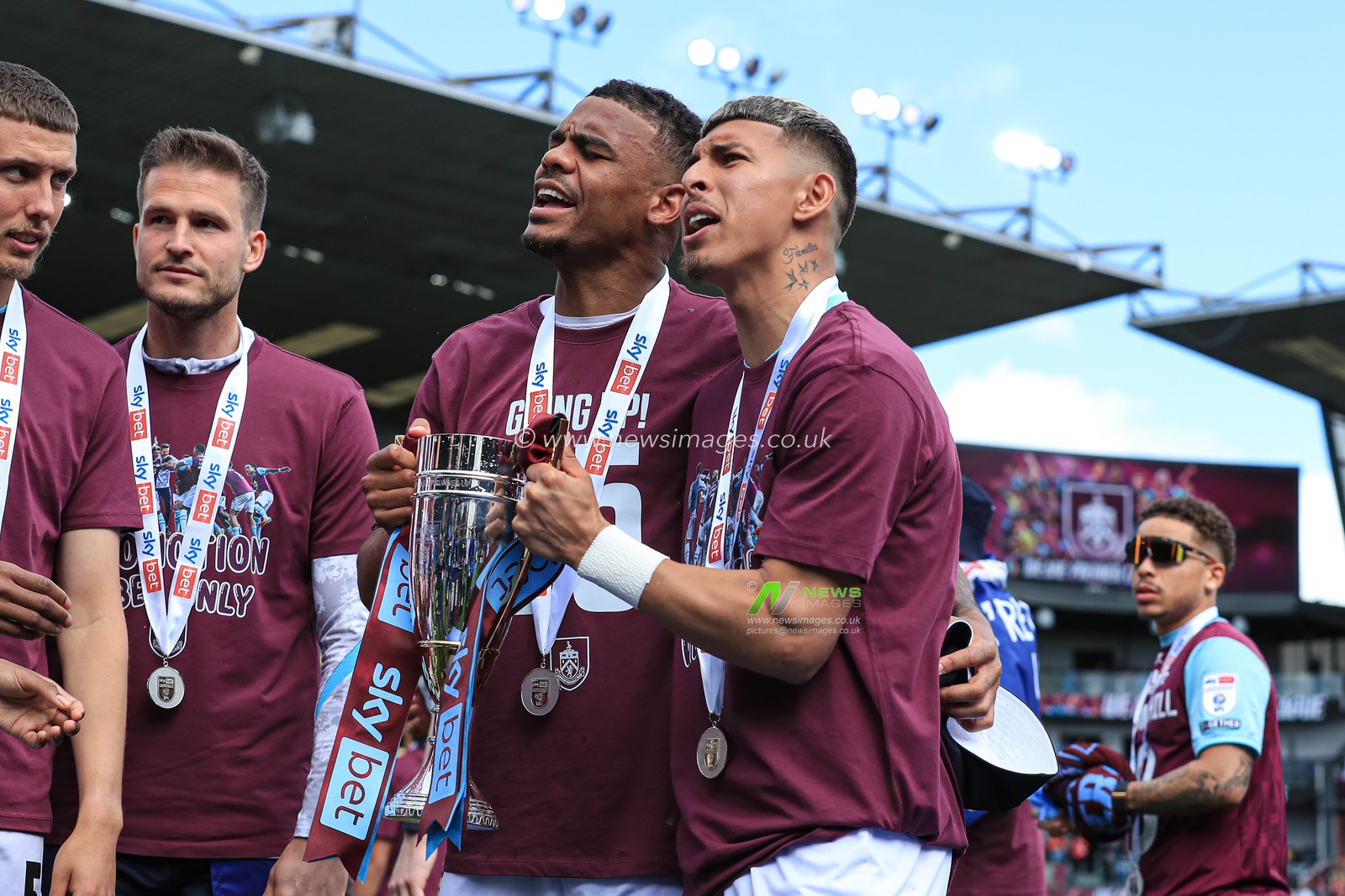 Lyle Foster of Burnley and Jeremy Sarmiento of Burnley holds up runners up trophy after the Sky Bet Championship match Burnley vs Millwall at Turf Moor, Burnley, United Kingdom, 3rd May 2025

(Photo by Jorge Horsted/News Images)
