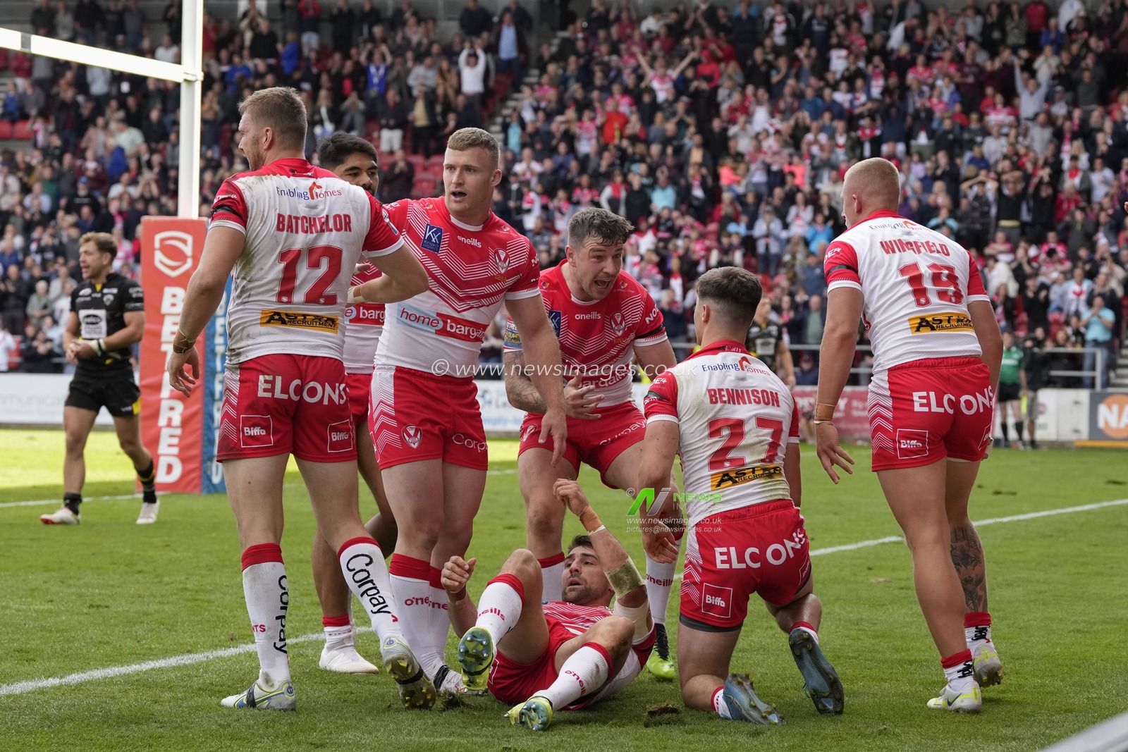 Mark Percival #4 celebrates with try scorer Joe Bennison #27 of St Helens during the Betfred Super League match St Helens vs Salford Red Devils at Totally Wicked Stadium, St Helens, United Kingdom, 17th September 2022

(Photo by Steve Flynn/News Images)