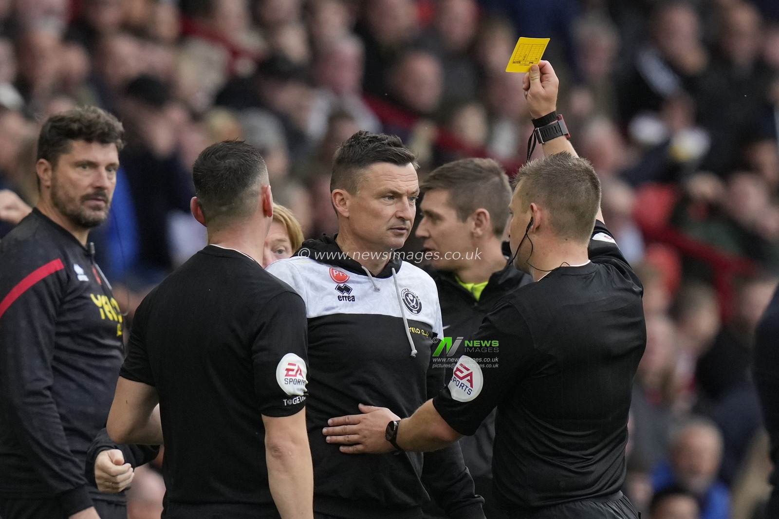 Referee Josh Smith shows a yellow card to Paul Heckingbottom manager of Sheffield United during the Sky Bet Championship match Sheffield United vs Norwich City at Bramall Lane, Sheffield, United Kingdom, 22nd October 2022

(Photo by Steve Flynn/News Images)