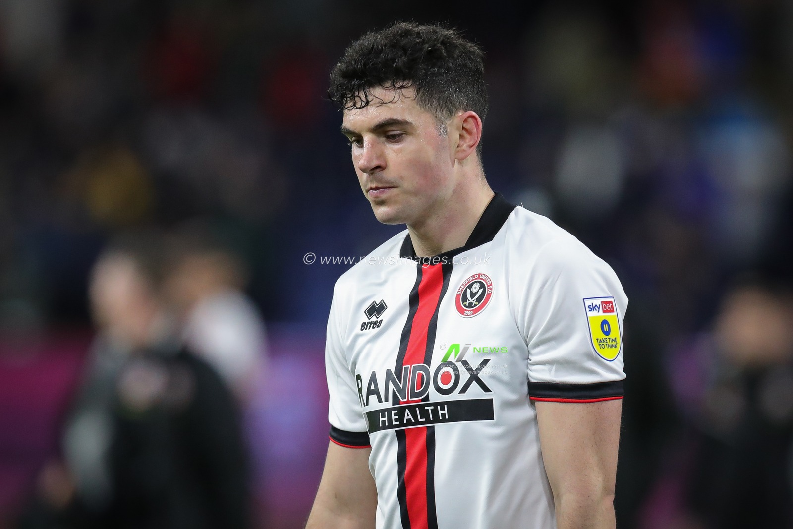 A dejected John Egan #12 of Sheffield United after the Sky Bet Championship match Burnley vs Sheffield United at Turf Moor, Burnley, United Kingdom, 10th April 2023

(Photo by James Heaton/News Images)