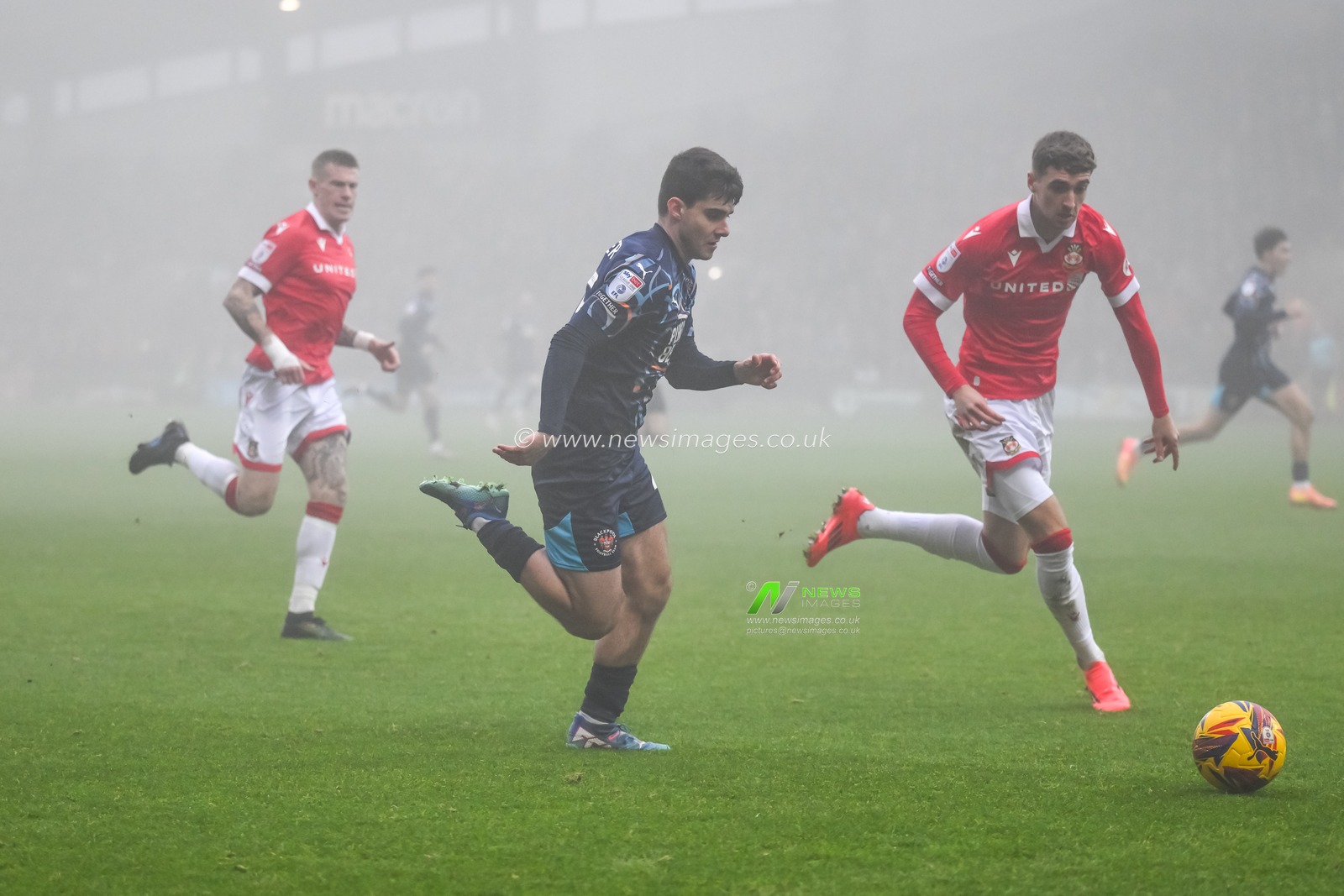 Rob Apter of Blackpool makes a break with the ball during the Sky Bet League 1 match Wrexham vs Blackpool at SToK Cae Ras, Wrexham, United Kingdom, 26th December 2024

(Photo by Craig Thomas/News Images)