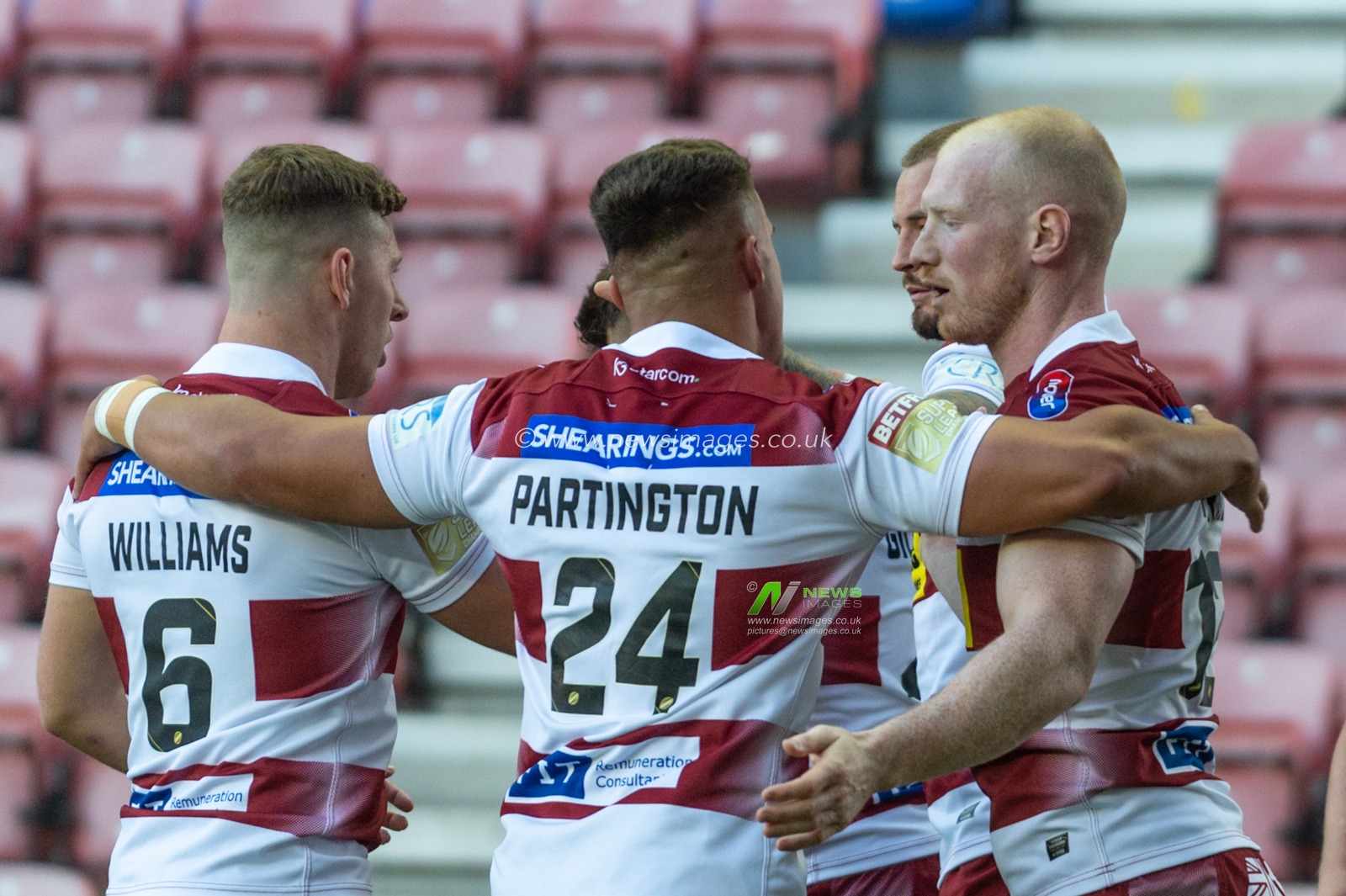 18th July 2019 , DW Stadium, Wigan, England;  Betfred Super League, Round 23, Wigan Warriors vs Wakefield Trinity ; Zak Hardaker of Wigan Warriors celebrates scoring his try with team mates

Credit: Richard Long/News Images