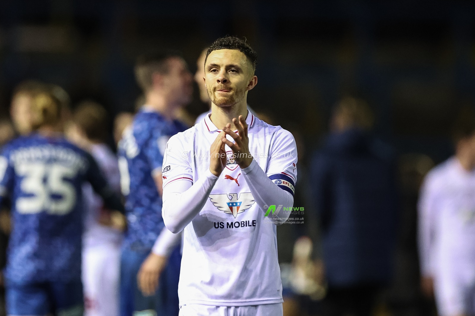 Jordan Williams of Barnsley applauds the traveling fans during the Sky Bet League 1 match Carlisle United vs Barnsley at Brunton Park, Carlisle, United Kingdom, 12th March 2024

(Photo by Mark Cosgrove/News Images)