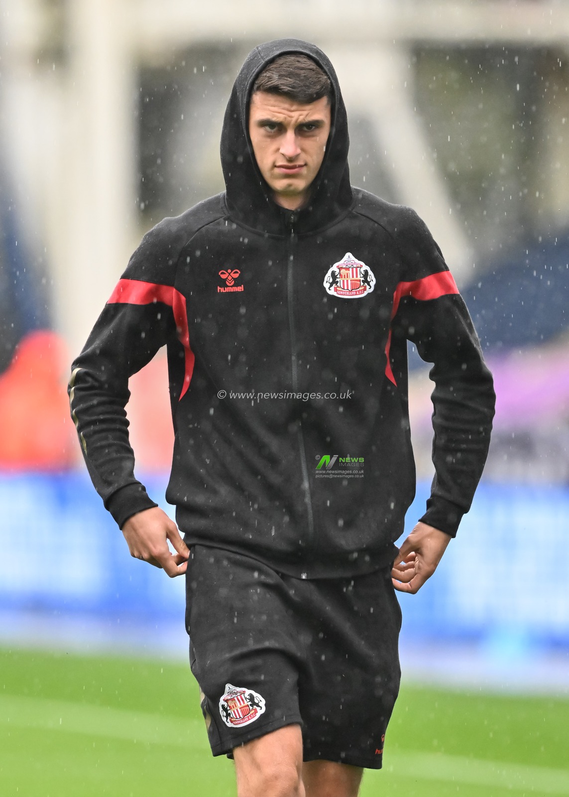Luke O'Nien of Sunderland inspects the pitch ahead of the Carabao Cup match Preston North End vs Sunderland at Deepdale, Preston, United Kingdom, 13th August 2024

(Photo by Cody Froggatt/News Images)