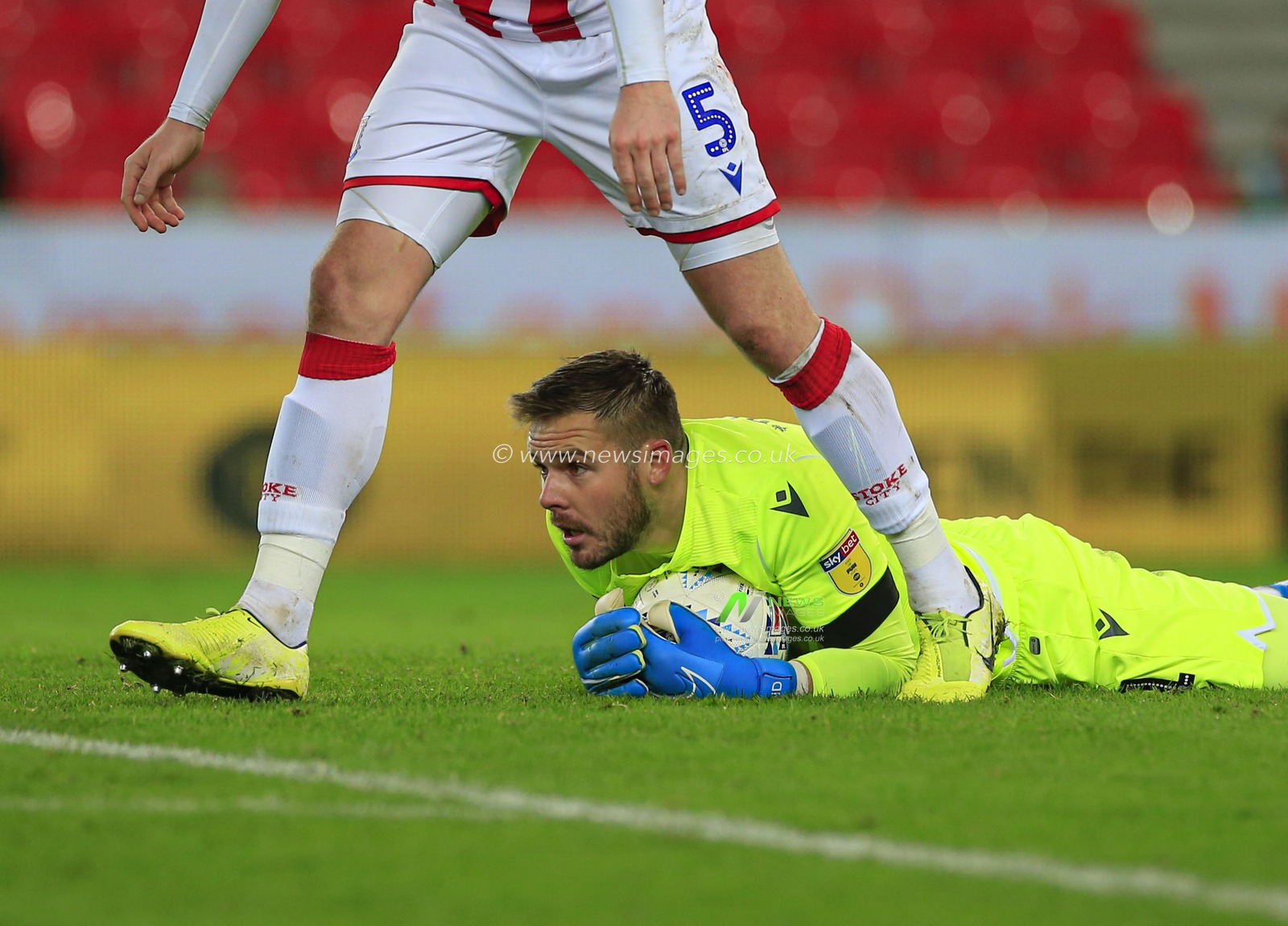 10th December 2019, Bet365 Stadium, Stoke-on-Trent, England; Sky Bet Championship, Stoke City v Luton Town : Jack Butland (1) of Stoke City grabs the ball

Credit: Conor Molloy/News Images
