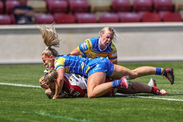 Georgia Wilson of Wigan Warriors goes over for a try during the Betfred Women's Challenge Cup Cup Semi-final match Leeds Rhinos vs Wigan Warriors at LNER Community Stadium, York, United Kingdom, 10th May 2025

(Photo by Alfie Cosgrove/News Images)