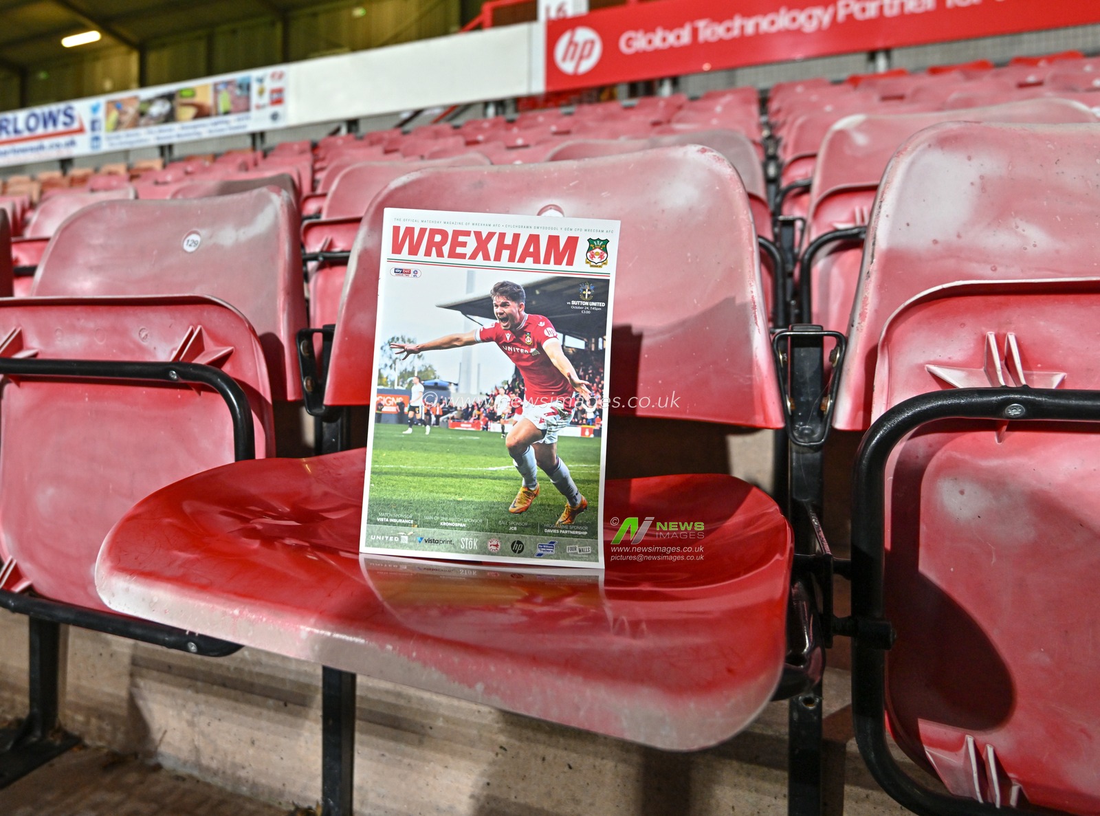 The match day program sit at during the SToK Cae Ras ahead of the match, Sky Bet League 2 match Wrexham vs Sutton United at SToK Cae Ras, Wrexham, United Kingdom, 24th October 2023

(Photo by Cody Froggatt/News Images)