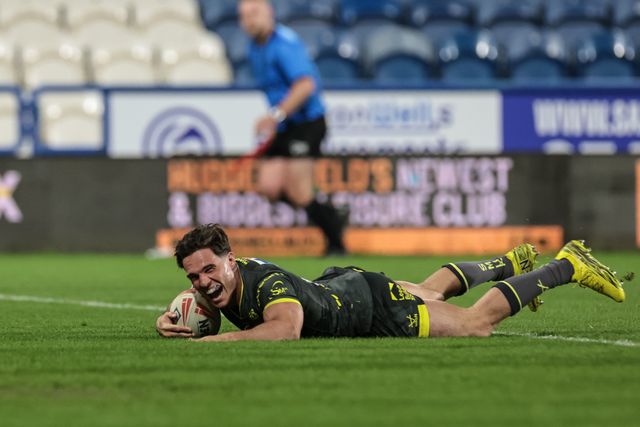 Brodie Croft of Leeds Rhinos goes over for a try during the Betfred Super League round 8 match Huddersfield Giants vs Leeds Rhinos at Accu Stadium, Huddersfield, United Kingdom on 17 April 2026

(Photo by Mark Cosgrove/News Images)