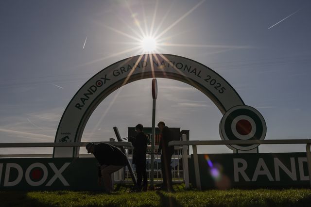 Race course staff prepare the finish line for the grand national during the Randox Grand National 2025 Day 3 Grand National Day at Aintree Racecourse, Liverpool, United Kingdom, 5th April 2025

(Photo by Mark Cosgrove/News Images)