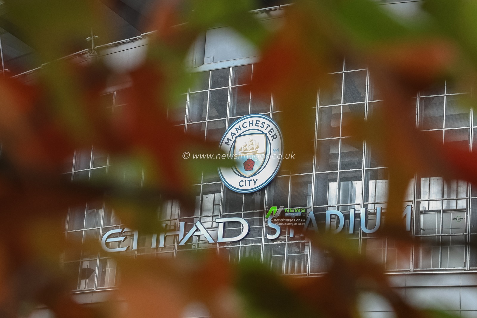 A general view of the Etihad Stadium through the autumnal leaves of near by trees during the UEFA Champions League, League Stage Manchester City v Sparta Prague at Etihad Stadium, Manchester, United Kingdom, 23rd October 2024

(Photo by Mark Cosgrove/News Images)