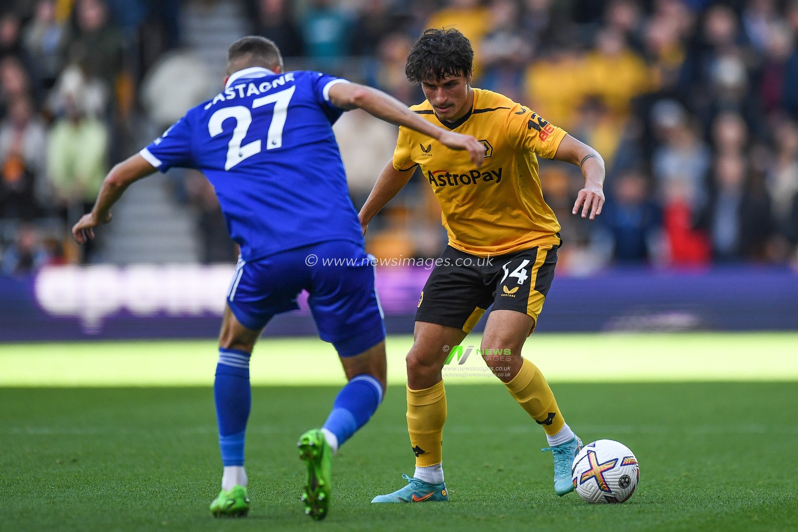 Hugo Bueno #64 of Wolverhampton Wanderers takes on Timoty Castagne #27 of Leicester City during the Premier League match Wolverhampton Wanderers vs Leicester City at Molineux, Wolverhampton, United Kingdom, 23rd October 2022

(Photo by Mike Jones/News Images)