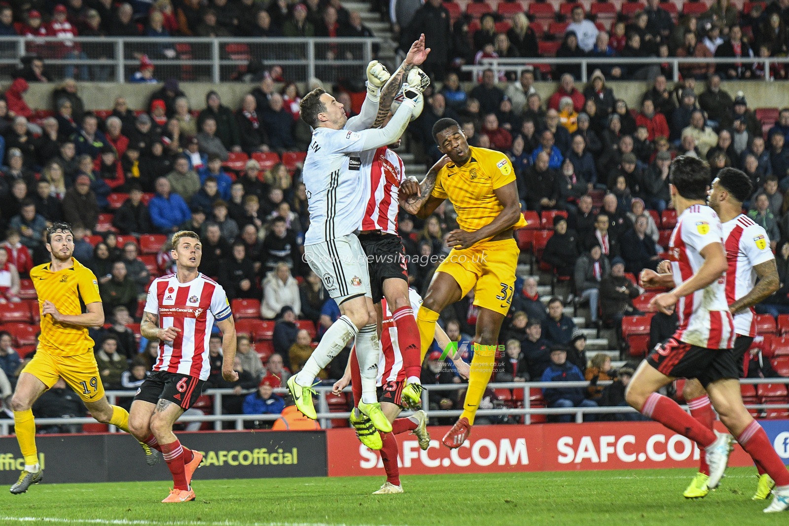 2nd November 2019, Stadium Of Light, Sunderland, England; Sky Bet League 1, Sunderland v Southend United : Jon McLaughlin of Sunderland tangles with Joel Lynch of Sunderland as he comes to catch the ball

Credit: Iam Burn/News Images
