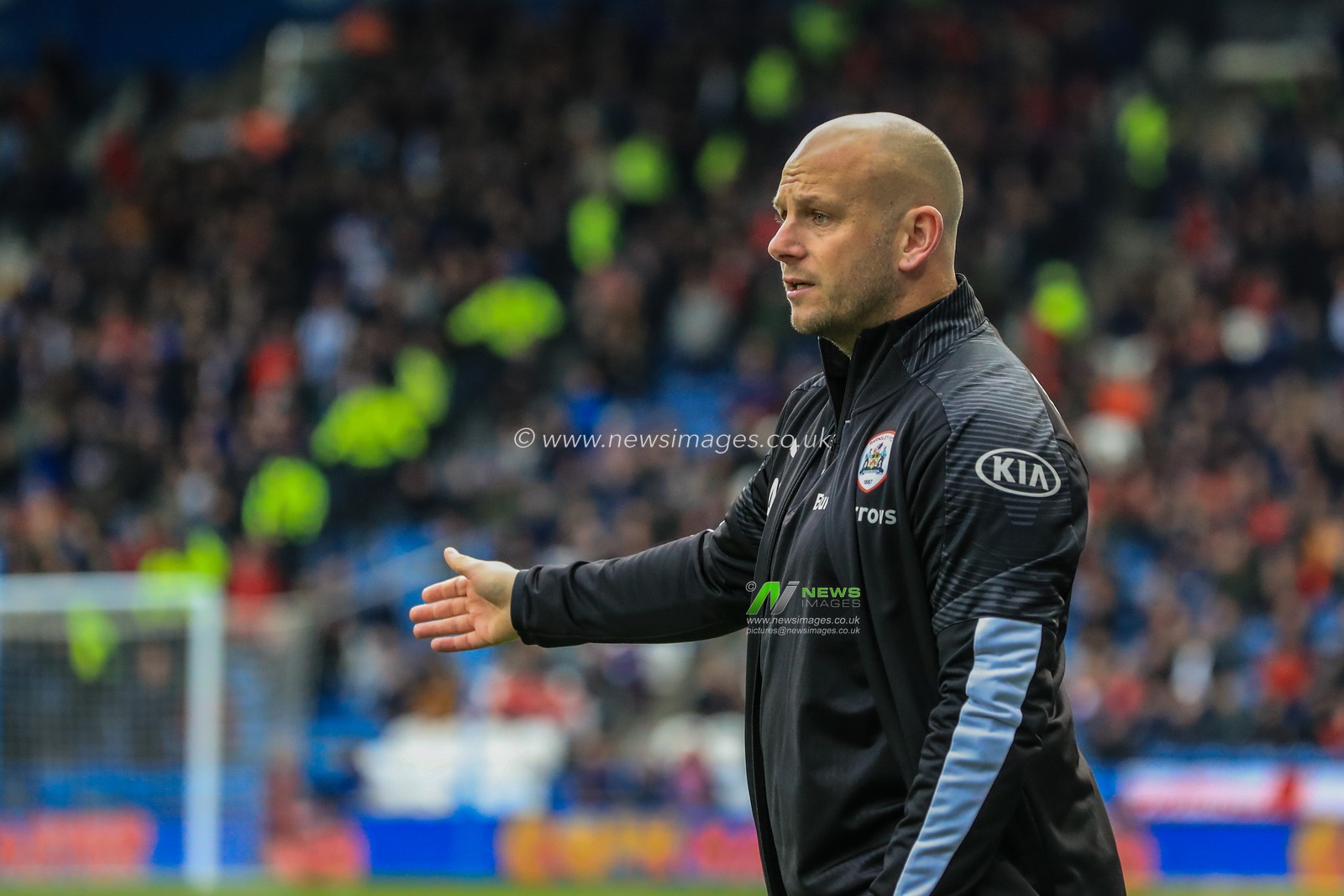 26th October 2019, John Smith's Stadium, Huddersfield, England; Sky Bet Championship, Huddersfield Town v Barnsley : Adam Murray caretaker manager of Barnsley FC gives his team instructions 

Credit: Mark Cosgrove/News Images