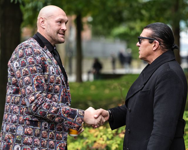 Tyson Fury shakes hands with Tamer Hassan during Ricky Hatton' Funeral at Manchester Cathedral, Manchester, United Kingdom, 10th October 2025

(Photo by Mark Cosgrove/News Images)