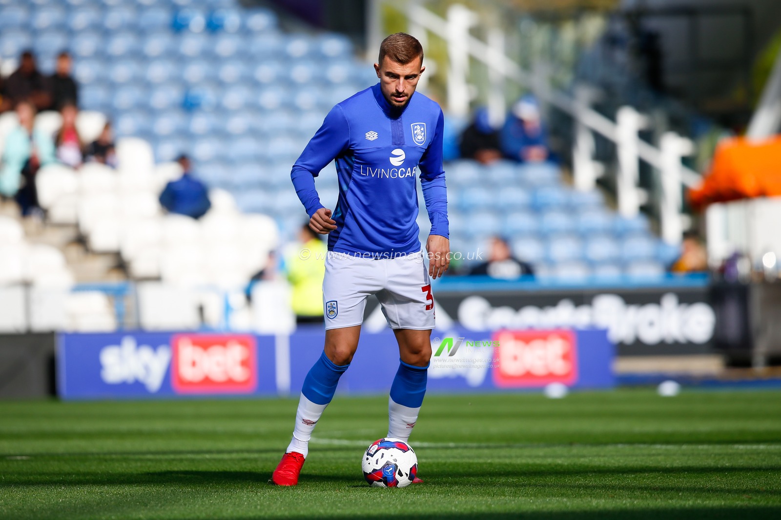 Michal Helik #39 of Huddersfield Town warms up before the Sky Bet Championship match Huddersfield Town vs Hull City at John Smith's Stadium, Huddersfield, United Kingdom, 9th October 2022

(Photo by Ben Early/News Images)