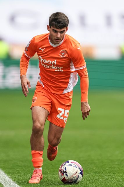 Rob Apter of Blackpool breaks with the ball during the Sky Bet League 1 match Wigan Athletic vs Blackpool at The Brick Community Stadium, Wigan, United Kingdom, 26th April 2025

(Photo by Mark Cosgrove/News Images)