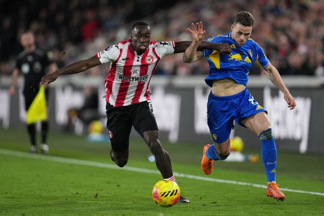 Gabriel Gudmundsson of Leeds United and Michael Kayode of Brentford during the Premier League match Brentford vs Leeds United at The Gtech Community Stadium, London, United Kingdom, 14th December 2025

(Photo by Harvey Murphy/News Images)

*** GER AUT SUI OUT ***