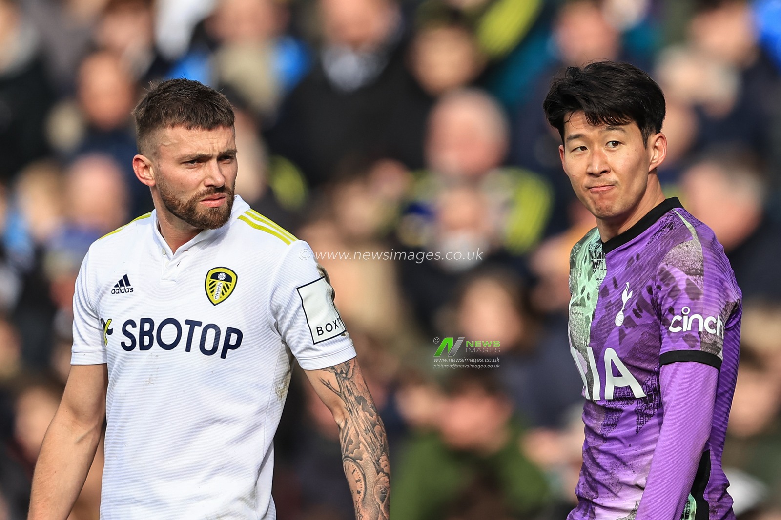 Stuart Dallas #15 of Leeds United and Son Heung-Min #7 of Tottenham Hotspur during the game