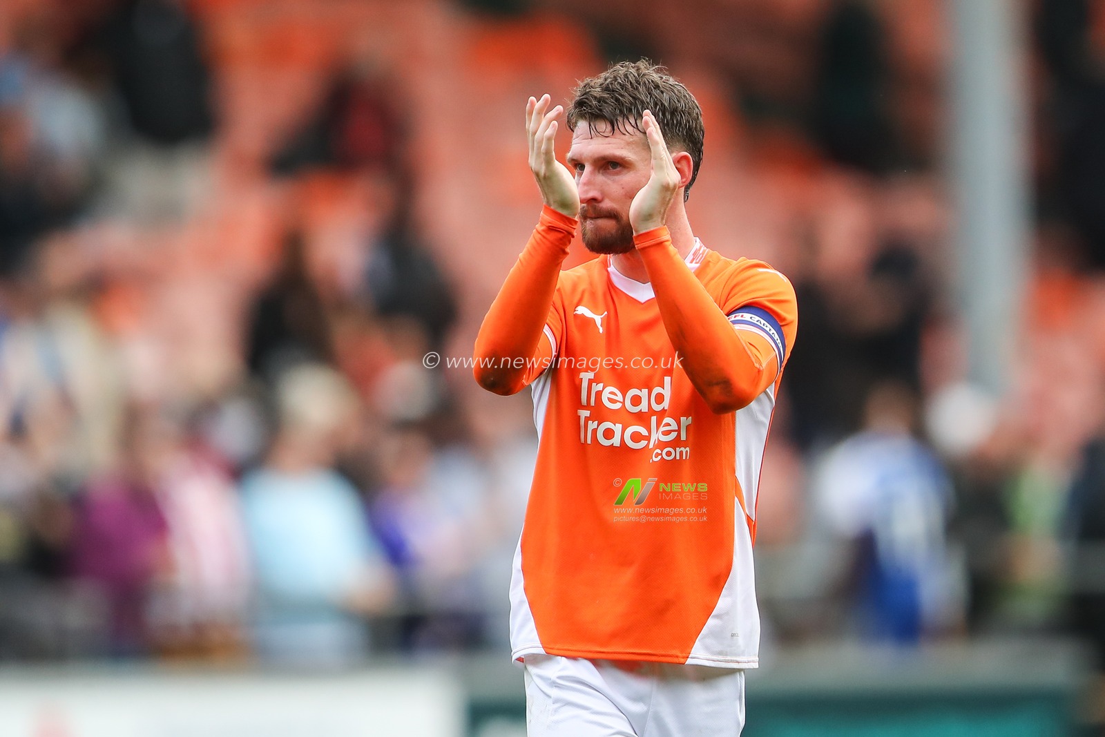 James Husband of Blackpool applauds the home fans after the Sky Bet League 1 match Blackpool vs Exeter City at Bloomfield Road, Blackpool, United Kingdom, 14th September 2024

(Photo by Gareth Evans/News Images)