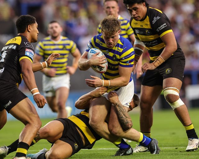 Luke Thomas of Warrington Wolves is tackled during the Betfred Super League round 23 match Warrington Wolves vs York Knights at The Halliwell Jones Stadium, Warrington, United Kingdom on 13 August 2026

(Photo by Mark Cosgrove/News Images)
