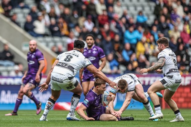Sam Halsall of Huddersfield Giants is tackled by Ed Chamberlain of Hull FC during the Betfred Magic Weekend 2025 match Huddersfield Giants vs Hull FC at St. James's Park, Newcastle, United Kingdom, 4th May 2025

(Photo by Mark Cosgrove/News Images)
