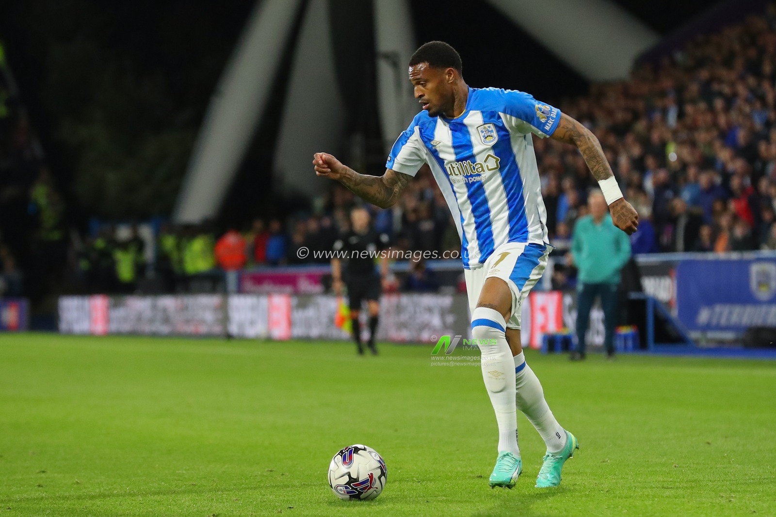 Delano Burgzorg #7 of Huddersfield Town goes forward with the ball during the Sky Bet Championship match Huddersfield Town vs Stoke City at John Smith's Stadium, Huddersfield, United Kingdom, 20th September 2023

(Photo by Gareth Evans/News Images)