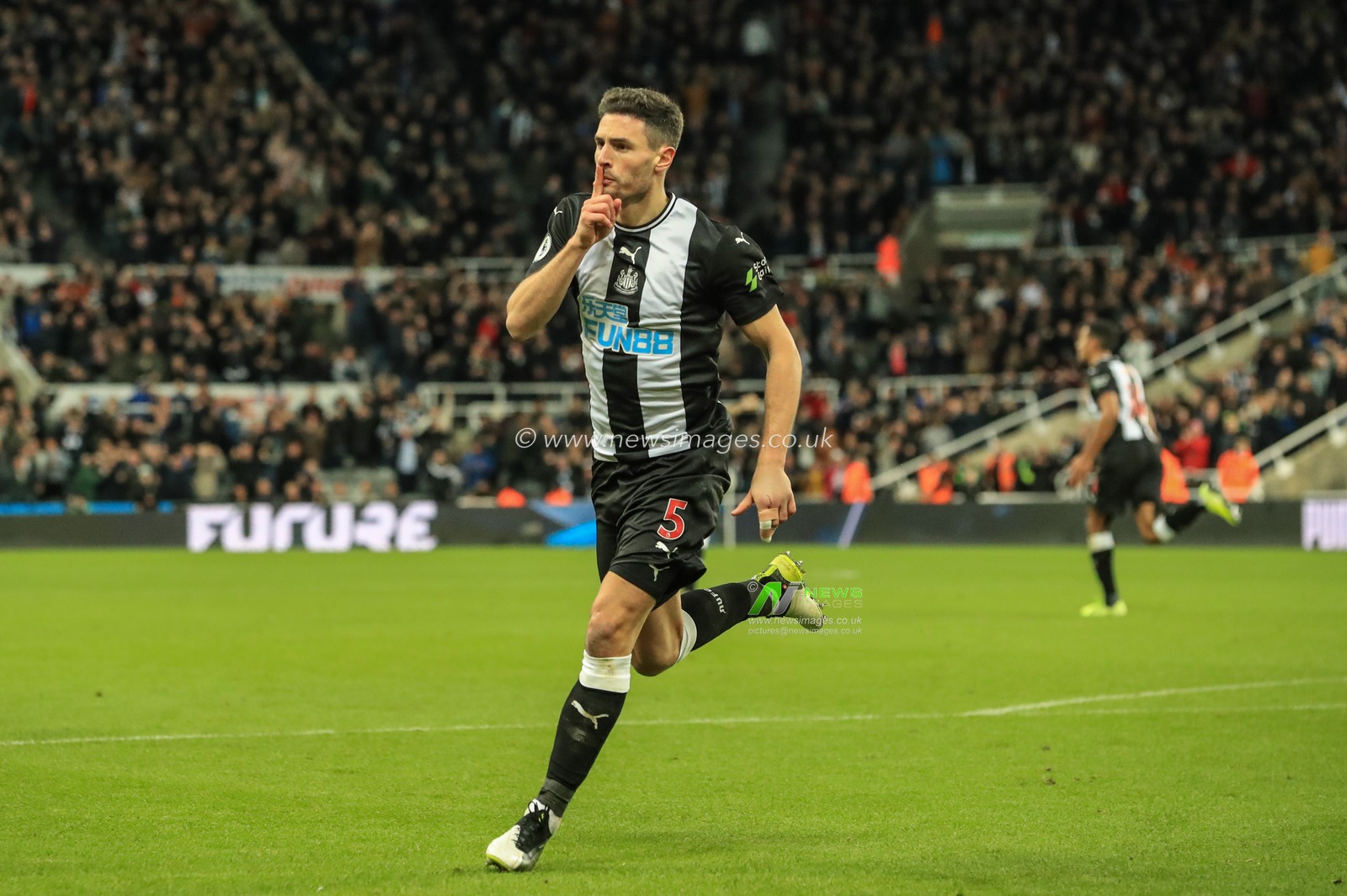 28th December 2019, St. James's Park, Newcastle, England; Premier League, Newcastle United v Everton : Fabian Schar (5) of Newcastle United celebrates his goal to make it 1-1

Credit: Mark Cosgrove/News Images