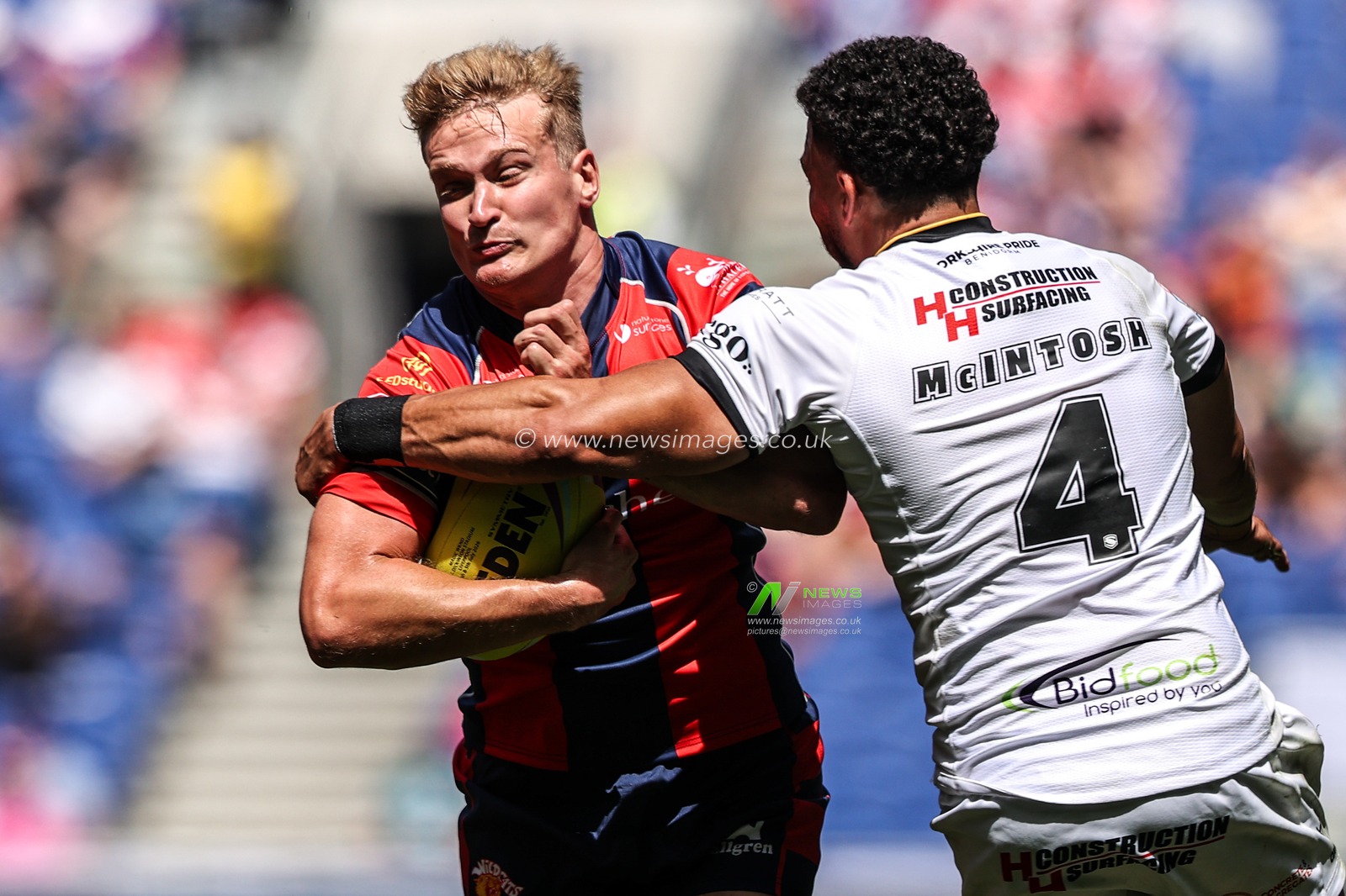 Will Tate of Wakefield Trinity is tackled by Darnell McIntosh of Castleford Tigers during the Betfred Super League Magic Weekend match Wakefield Trinity vs Castleford Tigers at Hill Dickinson Stadium, Liverpool, United Kingdom on 05 July 2026

(Photo by Alfie Cosgrove/News Images)